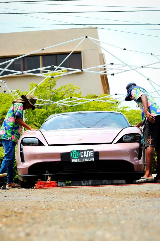 Porsche Taycan, hand wash under the canopy