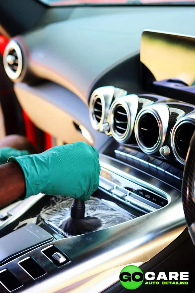 Detail brush cleaning a Mercedes interior